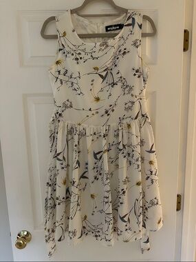 Sleeveless Cream Floral Mini Dress with Blue and Yellow Accents